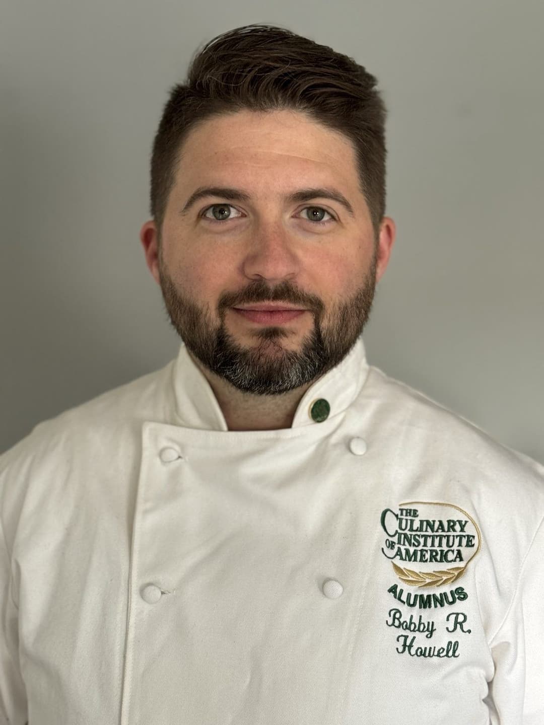 Chef Bobby Howell in his Culinary Institute of America chef coat
