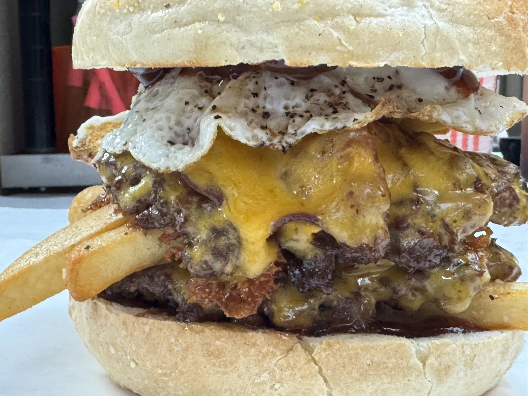Loaded burger with fries from Windsor Deli